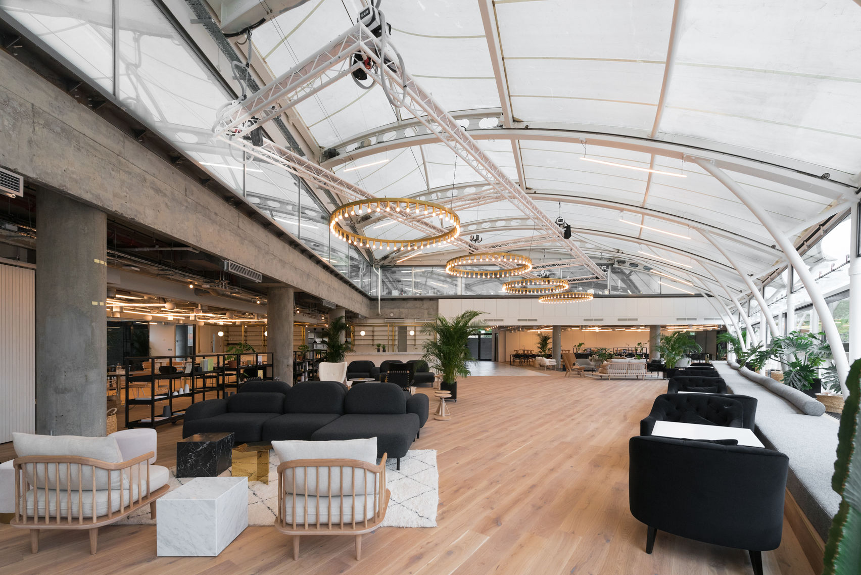 large event space with a glass ceiling and full of natural light